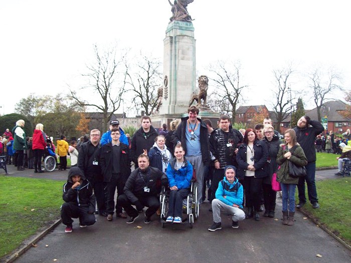 The Pathways students outside the First World War Memorial in Ashton 